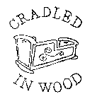 CRADLED IN WOOD