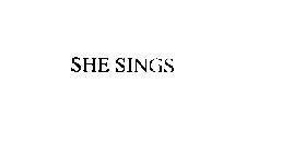 SHE SINGS