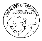 THERAPAWS OF MICHIGAN SHARING THE HUMAN-ANIMAL BOND