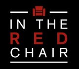 IN THE RED CHAIR