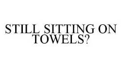 STILL SITTING ON TOWELS?