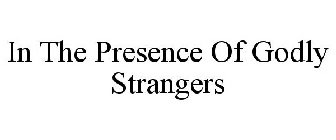 IN THE PRESENCE OF GODLY STRANGERS