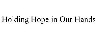 HOLDING HOPE IN OUR HANDS