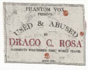 PHANTOM VOX PRESENTS USED & ABUSED BY DRACO C. ROSA GARMENTS WEATHERED THRU WORLD TRAVEL SINCE 1989