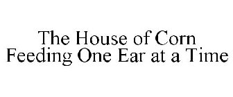 THE HOUSE OF CORN FEEDING ONE EAR AT A TIME