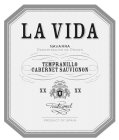 LA VIDA NAVARRA DENOMINACION DE ORIGEN TEMPRANILLO CABERNET SAUVIGNON XX XX TRADICIONAL PRODUCT OF SPAIN