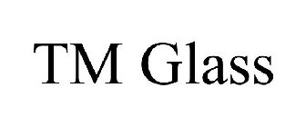 T.M. GLASS
