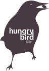 HUNGRY BIRD EATS