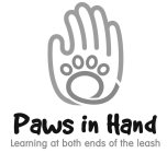 PAWS IN HAND LEARNING AT BOTH ENDS OF THE LEASH