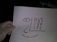 LOVE LIVE LIFE WITH A HEART ON THE RIGHT CHEEK
