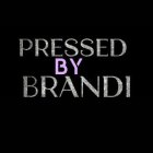 PRESSED BY BRANDI