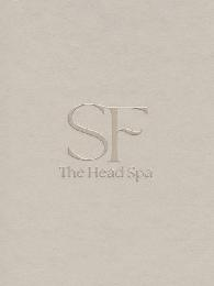 CAPITALIZED SF CENTERED WITH THE WORDS THE HEAD SPA UNDERNEATH IT